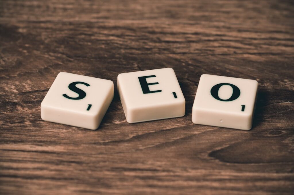 pexels-photo-270637 Scrabble tiles spelling 'SEO' on a wooden surface. Ideal for digital marketing themes.